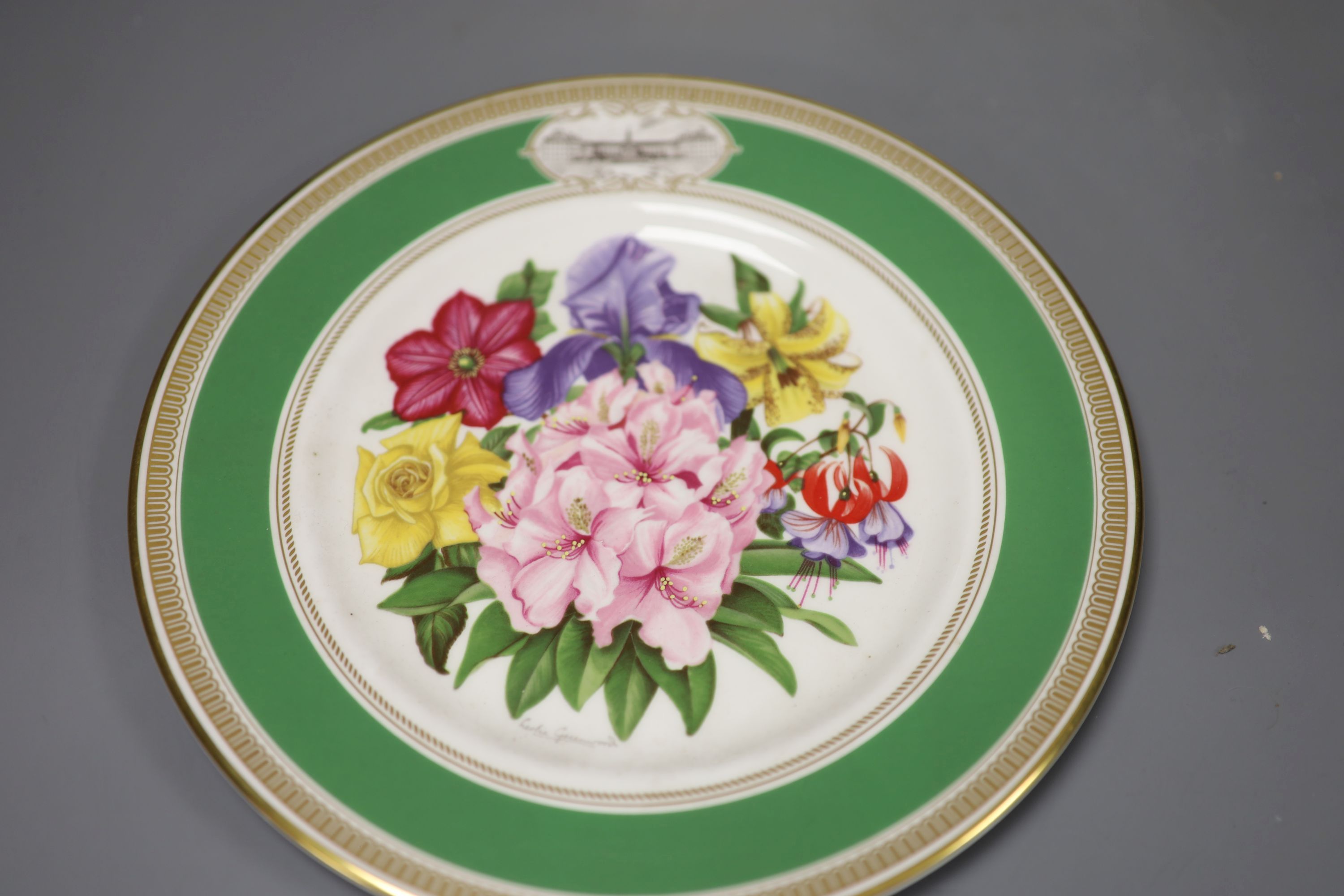 A Spode blue ground bowl, diameter 26cm, two cabinet plates painted with a floral bouquet and a Berlin KPM blue and white vase (4)